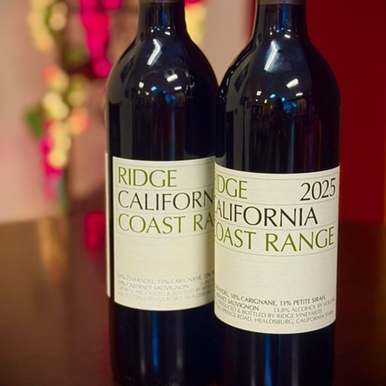 Two bottles of 2025 Ridge California Coast Range red wine with cream labels and green lettering